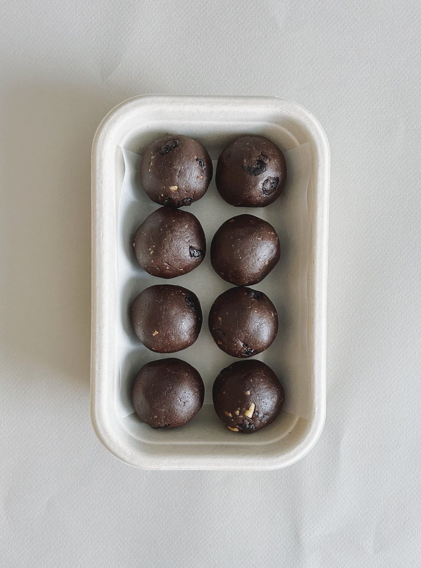 SPECIAL EDITION ODE + TWO SUNS COLLAB dark chocolate, sour cherry + smoked sea salt bliss balls